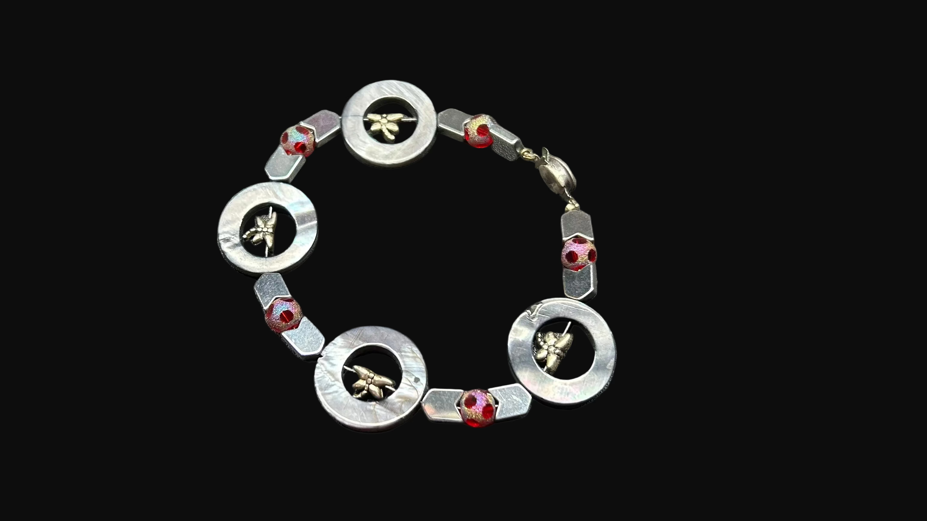 Silver Dragonfly and red bracelet